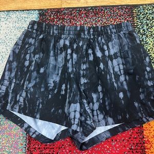 Printed and plain black shorts